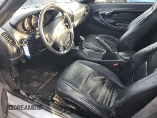 2000 Porsche Boxster z VIN WP0CA2980YU626179, wystawiony jako Copart lot #44728325 z przebiegiem 103 173 mil mil oraz Szkody całkowita. Historia ofert i sprzedaży dostępna na DreamBid. Obrazek 7.