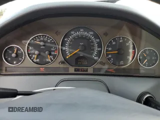 1999 Mercedes-Benz SL-Class with VIN WDBFA68F4XF184335, listed as a Copart auction lot 86287834 with 97,564 mi miles and Salvage Title. Bid and sale history available at carsss.com. Image 9.