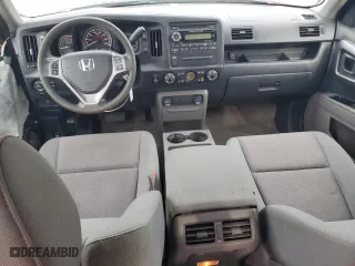 2012 Honda Ridgeline RTS with VIN 5FPYK1F46CB460256, listed as a Copart auction lot 70879644 with 136,217 mi miles and Salvage Title. Bid and sale history available at carsss.com. Image 8.