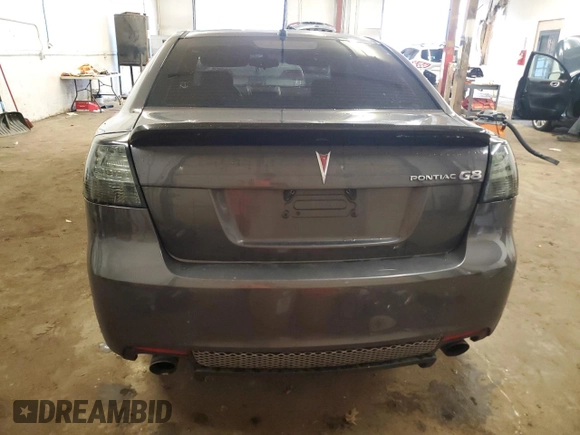 2009 Pontiac G8 z VIN 6G2ER57739L205634, wystawiony jako Copart lot #58935145 z przebiegiem 181 490 mil mil oraz Czysty tytuł • Clean title. Historia ofert i sprzedaży dostępna na DreamBid. Obrazek 6.