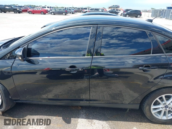 2015 Ford Focus SE with VIN 1FADP3F2XFL313657, listed as a IAAI auction lot 42205474 with 161,353 mi miles and . Bid and sale history available at DreamBid. Image 14.