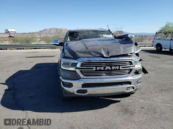 2020 Ram 1500 Laramie with VIN 1C6RREJT5LN139087, listed as a Copart auction lot 56407905 with 122,899 mi miles and Salvage title. Bid and sale history available at DreamBid. Image 13.