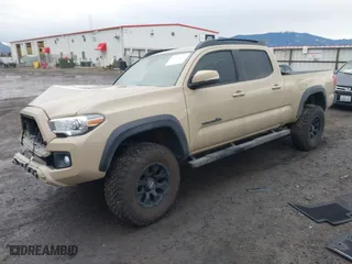 2019 Toyota Tacoma 4WD SR5 with VIN 3TMDZ5BN8KM061383, listed as a IAAI auction lot 41657160 with 72,293 mi miles. Bid and sale history available at carsss.com. Image 18.