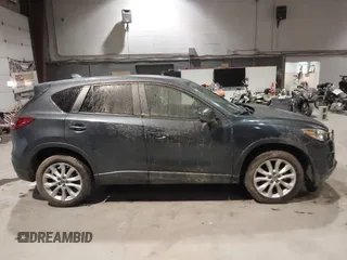2013 Mazda CX-5 Grand Touring with VIN JM3KE2DE3D0128449, listed as a IAAI auction lot 41161558 with 108,618 mi miles. Bid and sale history available at carsss.com. Image 13.