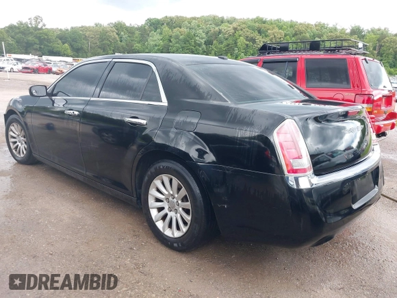 2013 Chrysler 300 with VIN 2C3CCAAG4DH557991, listed as a IAAI auction lot 42398680 with 178,150 mi miles and . Bid and sale history available at DreamBid. Image 3.