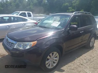 2013 Subaru Forester X Premium with VIN JF2SHADCXDH427822, listed as a IAAI auction lot 42409052 with 125,402 mi miles and . Bid and sale history available at DreamBid. Image 2.