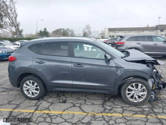 2019 Hyundai Tucson Value with VIN KM8J33A49KU071977, listed as a IAAI auction lot 41515460 with 24,701 mi miles. Bid and sale history available at carsss.com. Image 12.