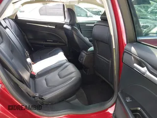2017 Ford Fusion Titanium with VIN 3FA6P0K98HR207447, listed as a IAAI auction lot 42422213 with 59,549 mi miles and . Bid and sale history available at DreamBid. Image 8.