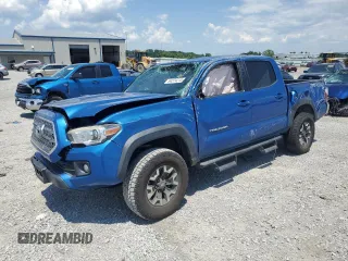 2016 Toyota Tacoma SR with VIN 3TMCZ5AN5GM040883, listed as a Copart auction lot 64374215 with Not provided miles and Salvage title. Bid and sale history available at DreamBid. Image 1.