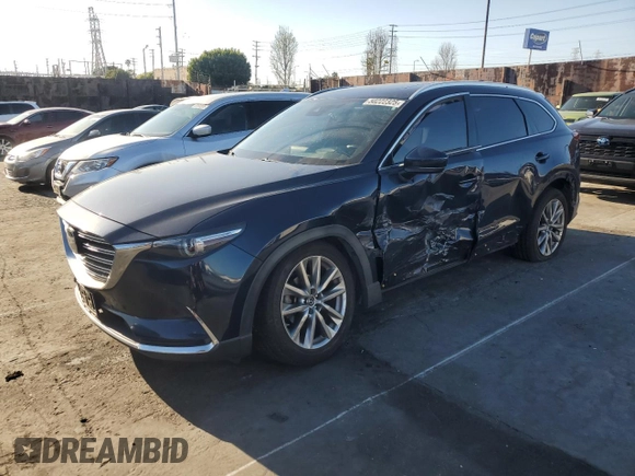 2018 Mazda CX-9 Grand Touring z VIN JM3TCADY3J0207176, wystawiony jako Copart lot #50222325 z przebiegiem 76 856 mil mil oraz Szkoda całkowita • Salvage title. Historia ofert i sprzedaży dostępna na DreamBid. Obrazek 1.