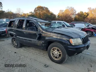 1999 Jeep Grand Cherokee Limited with VIN 1J4GW68S7XC676809, listed as a Copart auction lot 79059944 with 196,391 mi miles and Salvage Title. Bid and sale history available at carsss.com. Image 4.