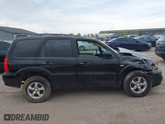 2005 Mazda Tribute S with VIN 4F2YZ96145KM32776, listed as a IAAI auction lot 42159162 with 200,416 mi miles and . Bid and sale history available at DreamBid. Image 12.