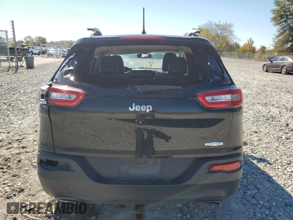 2018 Jeep Cherokee Latitude Plus with VIN 1C4PJLLXXJD557028, listed as a Copart auction lot 76671214 with 105,459 mi miles and Salvage Title. Bid and sale history available at carsss.com. Image 6.