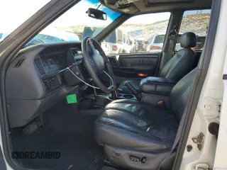 1998 Jeep Grand Cherokee Limited with VIN 1J4GZ88Z9WC180182, listed as a Copart auction lot 88602465 with 266,008 mi miles and Clean Title. Bid and sale history available at carsss.com. Image 7.