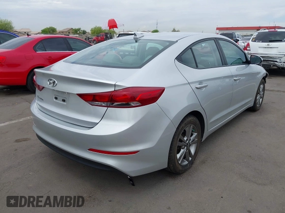 2018 Hyundai Elantra SEL with VIN 5NPD84LF8JH269014, listed as a IAAI auction lot 42023718 with 84,617 mi miles and . Bid and sale history available at DreamBid. Image 4.