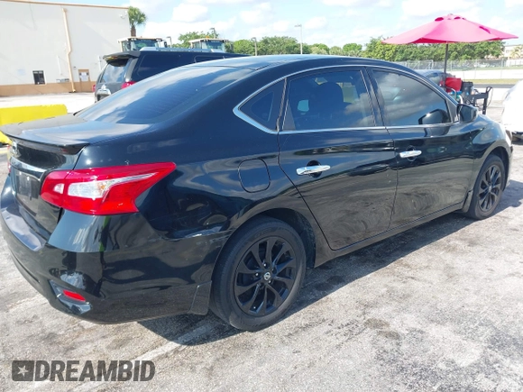 2018 Nissan Sentra S with VIN 3N1AB7AP2JY326055, listed as a IAAI auction lot 42221477 with 123,570 mi miles and . Bid and sale history available at DreamBid. Image 4.