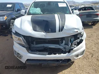 2018 Chevrolet Colorado 2WD Z71 with VIN 1GCGSDEN6J1173358, listed as a IAAI auction lot 41620340 with 93,185 mi miles and . Bid and sale history available at DreamBid. Image 6.