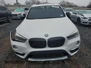 2016 BMW X1 xDrive28i with VIN WBXHT3C36GP881275, listed as a Copart auction lot 49181055 with 129,469 mi miles and Salvage Title. Bid and sale history available at carsss.com. Image 5.