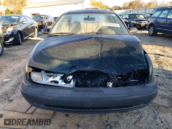 1997 Saturn SL z VIN 1G8ZH5285VZ122690, wystawiony jako Copart lot #81655244 z przebiegiem 159 048 mil mil oraz Szkoda całkowita • Salvage title. Historia ofert i sprzedaży dostępna na DreamBid. Obrazek 5.