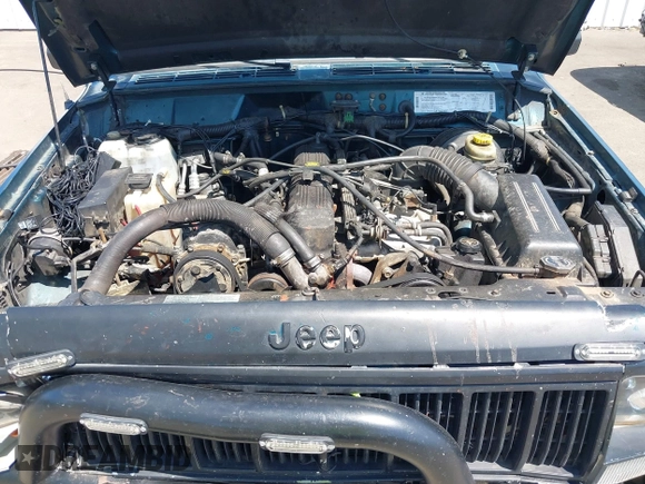 1995 Jeep Cherokee Sport with VIN 1J4FJ68S7SL631078, listed as a IAAI auction lot 42408148 with 190,765 mi miles and . Bid and sale history available at DreamBid. Image 10.