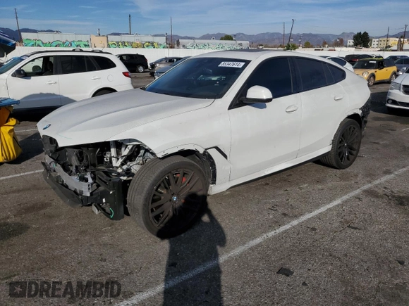 2023 BMW X6 xDrive40i z VIN 5UXCY6C02P9P43834, wystawiony jako Copart lot #85347614 z przebiegiem 16 921 mil mil oraz Szkoda całkowita • Salvage title. Historia ofert i sprzedaży dostępna na DreamBid. Obrazek 1.