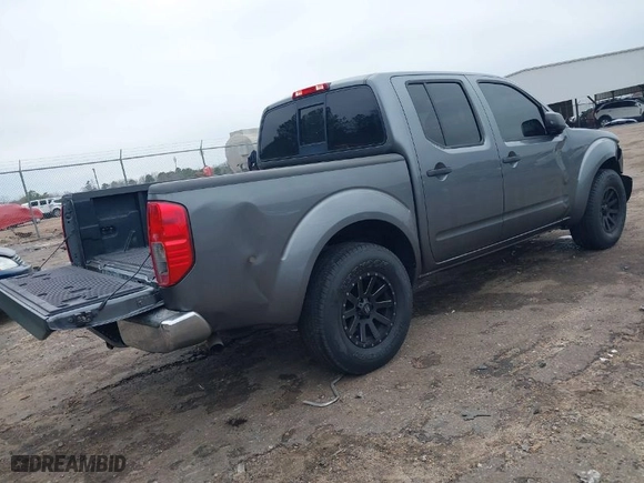 2018 Nissan Frontier SV V6 with VIN 1N6AD0ER0JN711523, listed as a IAAI auction lot 41429409 with 127,816 mi miles. Bid and sale history available at carsss.com. Image 4.