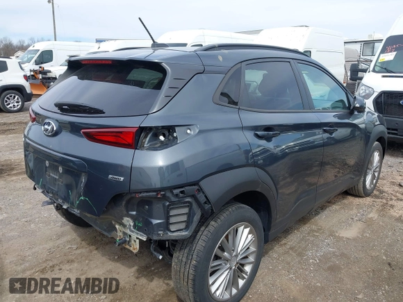 2019 Hyundai Kona SEL with VIN KM8K2CAA5KU352381, listed as a IAAI auction lot 41740117 with 57,044 mi miles and . Bid and sale history available at DreamBid. Image 4.