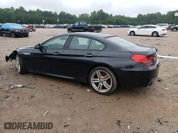 2017 BMW 6 Series 640i xDrive with VIN WBA6D2C58HGT66290, listed as a Copart auction lot 65738404 with 105,783 mi miles and Salvage Title. Bid and sale history available at carsss.com. Image 2.