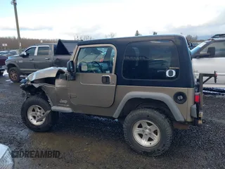2004 Jeep Wrangler Sport with VIN 1J4FA49S94P711531, listed as a IAAI auction lot 41306863 with 143,720 mi miles and . Bid and sale history available at DreamBid. Image 15.