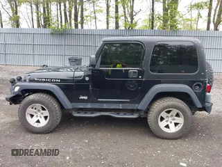 2006 Jeep Wrangler Rubicon z VIN 1J4FA69S76P749712, wystawiony jako IAAI lot #42240375 z przebiegiem 75 405 mil mil oraz . Historia ofert i sprzedaży dostępna na DreamBid. Obrazek 14.