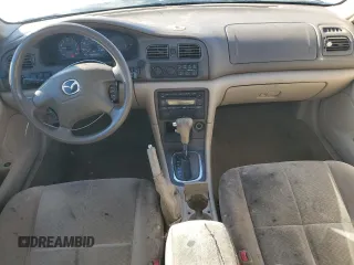 2001 Mazda 626 LX with VIN 1YVGF22C315225141, listed as a Copart auction lot 42004475 with 195,643 mi miles and Salvage Title. Bid and sale history available at carsss.com. Image 8.