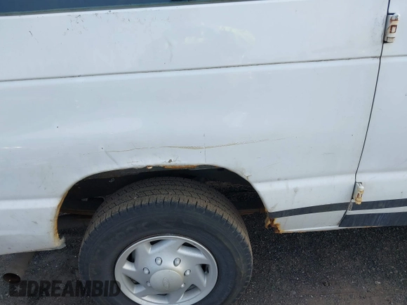 2008 Ford Econoline Cargo Commercial with VIN 1FTNE24L08DA50635, listed as a IAAI auction lot 41784919 with 90,975 mi miles and . Bid and sale history available at DreamBid. Image 12.
