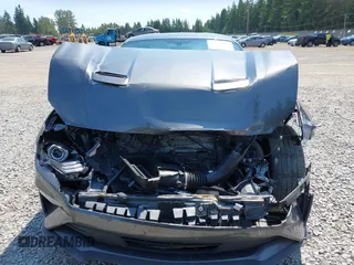 2020 Ford Mustang EcoBoost z VIN 1FA6P8TH9L5167587, wystawiony jako IAAI lot #42407141 z przebiegiem 38 757 mil mil oraz . Historia ofert i sprzedaży dostępna na DreamBid. Obrazek 13.