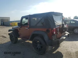 2009 Jeep Wrangler X with VIN 1J4FA24119L756089, listed as a Copart auction lot 56953205 with 158,157 mi miles and Salvage title. Bid and sale history available at DreamBid. Image 2.