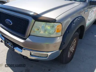 2005 Ford F-150 XLT with VIN 1FTPX14535FB40621, listed as a IAAI auction lot 42130458 with 122,764 mi miles. Bid and sale history available at carsss.com. Image 6.