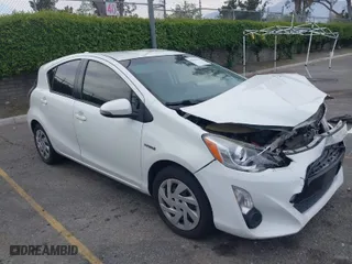 2015 Toyota Prius c One with VIN JTDKDTB3XF1097538, listed as a IAAI auction lot 42031057 with 100,847 mi miles. Bid and sale history available at carsss.com. Image 1.