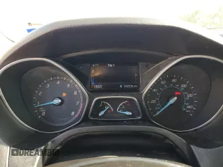 2014 Ford Focus Titanium z VIN 1FADP3N27EL161613, wystawiony jako Copart lot #56166805 z przebiegiem 140 336 mil mil oraz Szkoda całkowita • Salvage title. Historia ofert i sprzedaży dostępna na DreamBid. Obrazek 9.