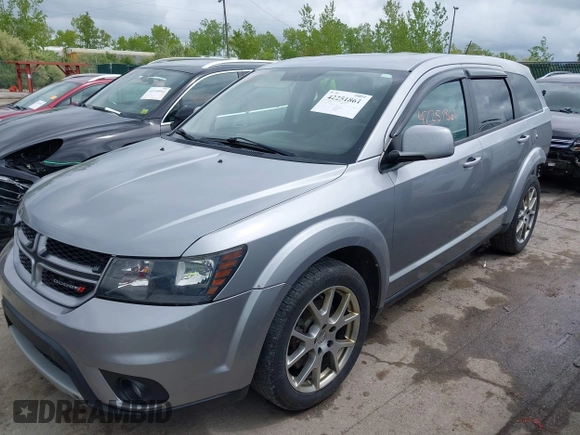 2015 Dodge Journey R/T with VIN 3C4PDCEG0FT679063, listed as a IAAI auction lot 42251861 with 138,258 mi miles and . Bid and sale history available at DreamBid. Image 2.