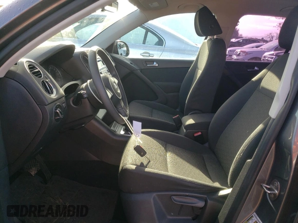 2012 Volkswagen Tiguan S with VIN WVGAV7AX7CW002660, listed as a Copart auction lot 86016034 with 185,938 mi miles and Salvage title. Bid and sale history available at DreamBid. Image 7.
