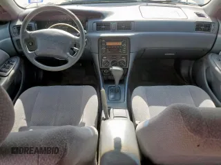 2000 Toyota Camry CE с VIN JT2BG22KXY0391368, выставлен на аукционе Copart как лот 59923575 с пробегом 220 660 миль миль и Списание • Salvage title. История ставок и продаж доступна на DreamBid. Изображение 8.