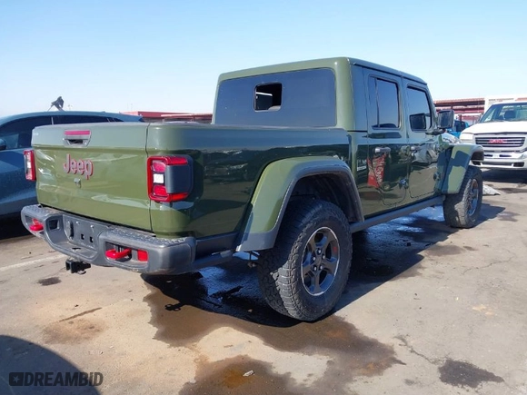 2022 Jeep Gladiator Rubicon with VIN 1C6JJTBG1NL163699, listed as a IAAI auction lot 41014300 with 1 mi miles. Bid and sale history available at carsss.com. Image 4.