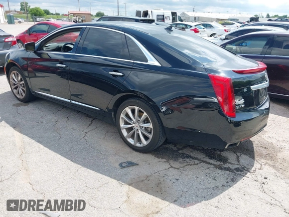 2013 Cadillac XTS Premium with VIN 2G61S5S39D9144177, listed as a IAAI auction lot 42111910 with 69,830 mi miles. Bid and sale history available at carsss.com. Image 3.