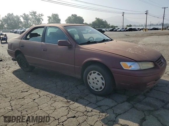 1998 Toyota Camry LE с VIN 4T1BG22K3WU313572, выставлен на аукционе Copart как лот 60435655 с пробегом 246 229 миль миль и Списание • Salvage title. История ставок и продаж доступна на DreamBid. Изображение 4.