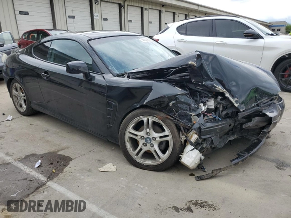 2006 Hyundai Tiburon GT z VIN KMHHN65F66U215304, wystawiony jako Copart lot #56141635 z przebiegiem 149 118 mil mil oraz Szkoda całkowita • Salvage title. Historia ofert i sprzedaży dostępna na DreamBid. Obrazek 4.