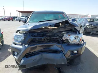 2014 Toyota Tacoma PreRunner with VIN 3TMJU4GN0EM164077, listed as a IAAI auction lot 41712542 with 69,443 mi miles. Bid and sale history available at carsss.com. Image 12.