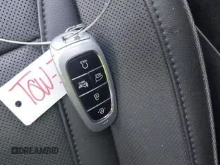 2022 Hyundai Tucson SEL z VIN 5NMJCCAE4NH096813, wystawiony jako IAAI lot #41899641 z przebiegiem 23 668 mil mil oraz . Historia ofert i sprzedaży dostępna na DreamBid. Obrazek 11.