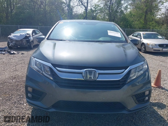 2018 Honda Odyssey EX-L z VIN 5FNRL6H77JB096733, wystawiony jako IAAI lot #42133737 z przebiegiem 165 069 mil mil oraz . Historia ofert i sprzedaży dostępna na DreamBid. Obrazek 12.