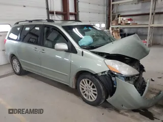 2009 Toyota Sienna XLE with VIN 5TDZK22C59S256844, listed as a IAAI auction lot 41668889 with 299,124 mi miles. Bid and sale history available at carsss.com. Image 1.