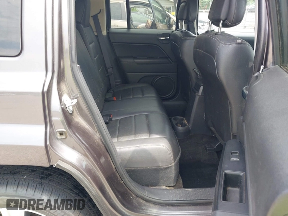 2016 Jeep Patriot Latitude with VIN 1C4NJRFB9GD523102, listed as a IAAI auction lot 42598712 with 144,808 mi miles and . Bid and sale history available at DreamBid. Image 8.