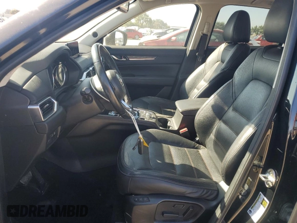 2018 Mazda CX-5 Grand Touring с VIN JM3KFADM2J1310339, выставлен на аукционе Copart как лот 64705245 с пробегом 63 927 миль миль и Списание • Salvage title. История ставок и продаж доступна на DreamBid. Изображение 7.